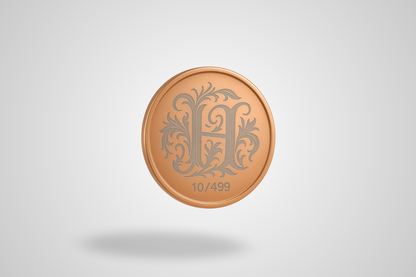 A photo of a laser engraved copper coin